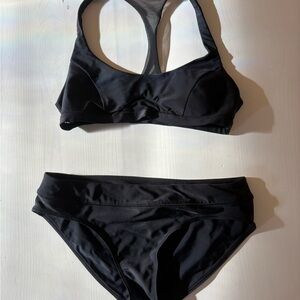 Lululemon black bathing suit. No tags. Fits 4-6 for both top and bottom.